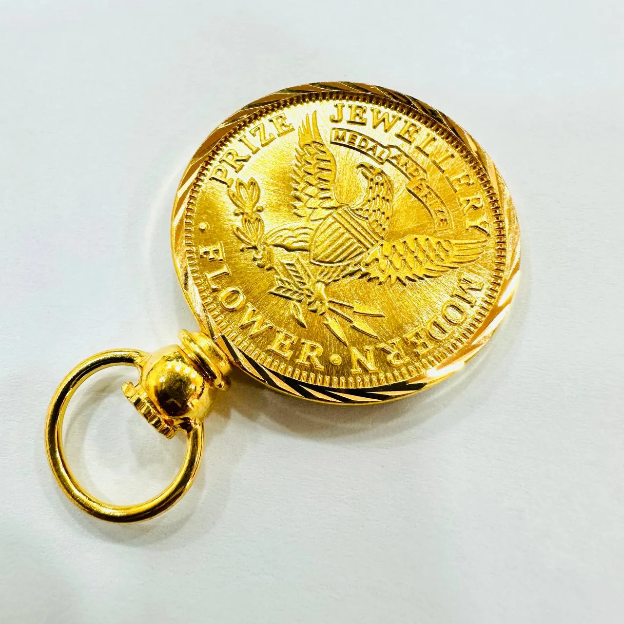 Sure! Here’s an optimized title for your e-commerce product:

Elegant 22K Gold Queen Elizabeth Coin Pendant with 916 Gold Frame - Timeless Jewelry Piece

This title highlights the quality of the gold, the unique aspect of the coin, and the elegance of the pendant, making it appealing to potential buyers.