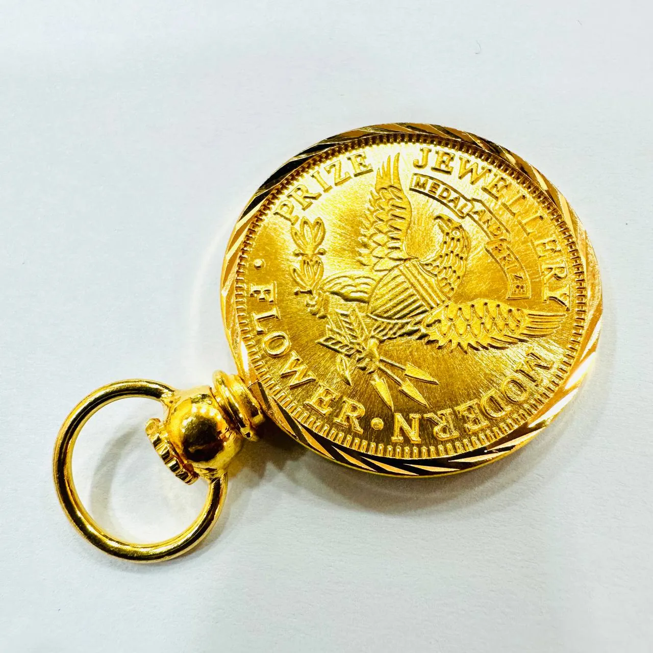 Sure! Here’s an optimized title for your e-commerce product:

Elegant 22K Gold Queen Elizabeth Coin Pendant with 916 Gold Frame - Timeless Jewelry Piece

This title highlights the quality of the gold, the unique aspect of the coin, and the elegance of the pendant, making it appealing to potential buyers.