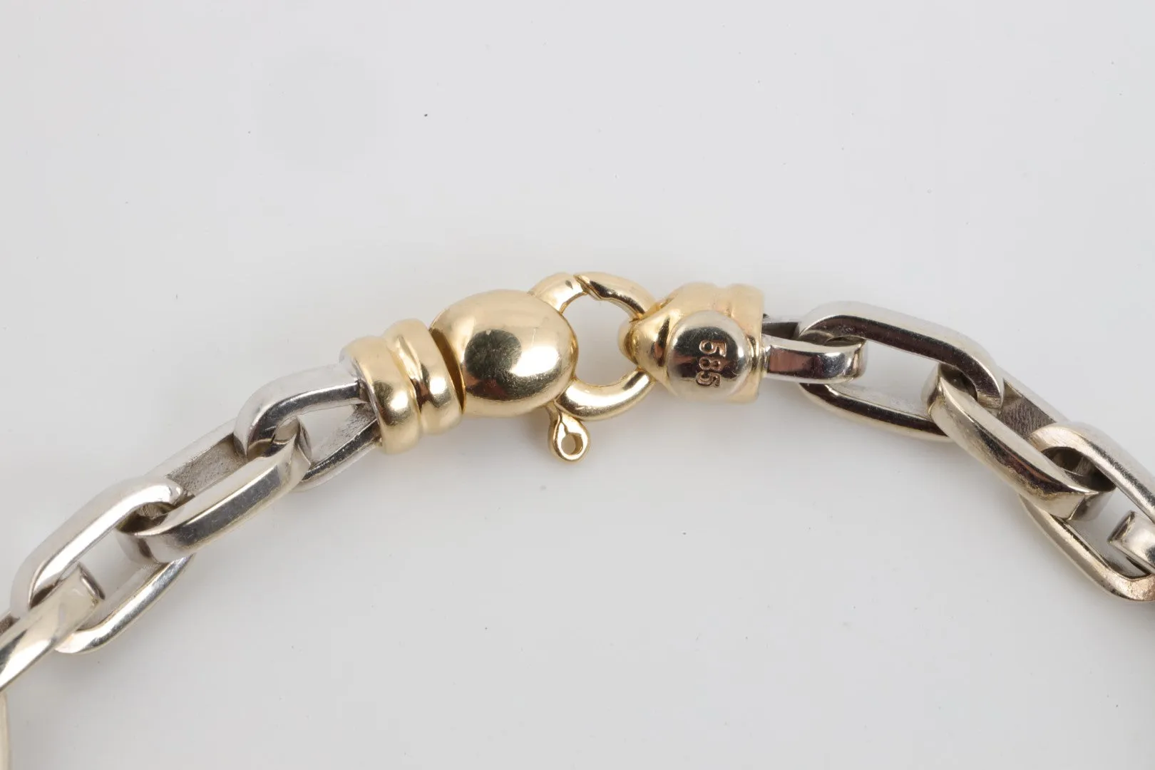 7.5" Bvlgari 14k Two-Tone Gold Charm Bracelet (31.18g.)