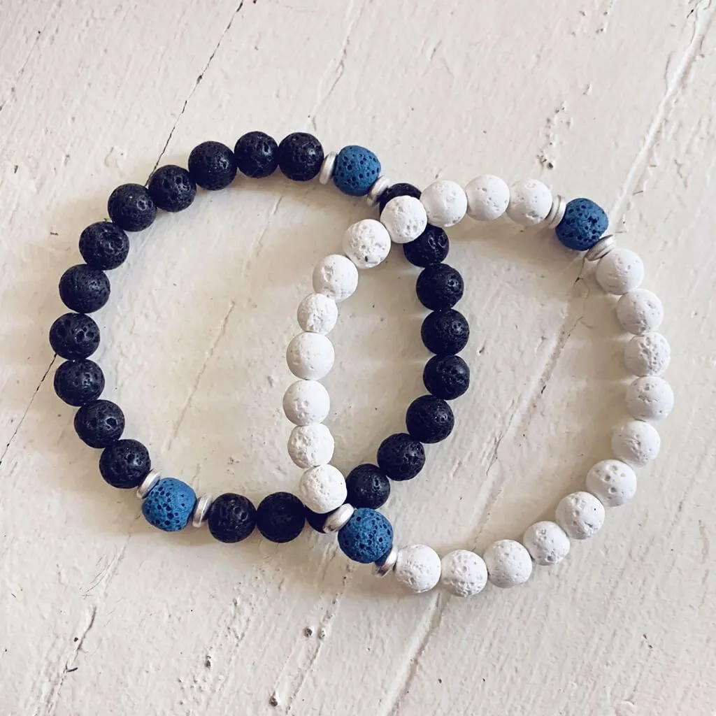 balance // water drop black and white lava bead wrist mala bracelet