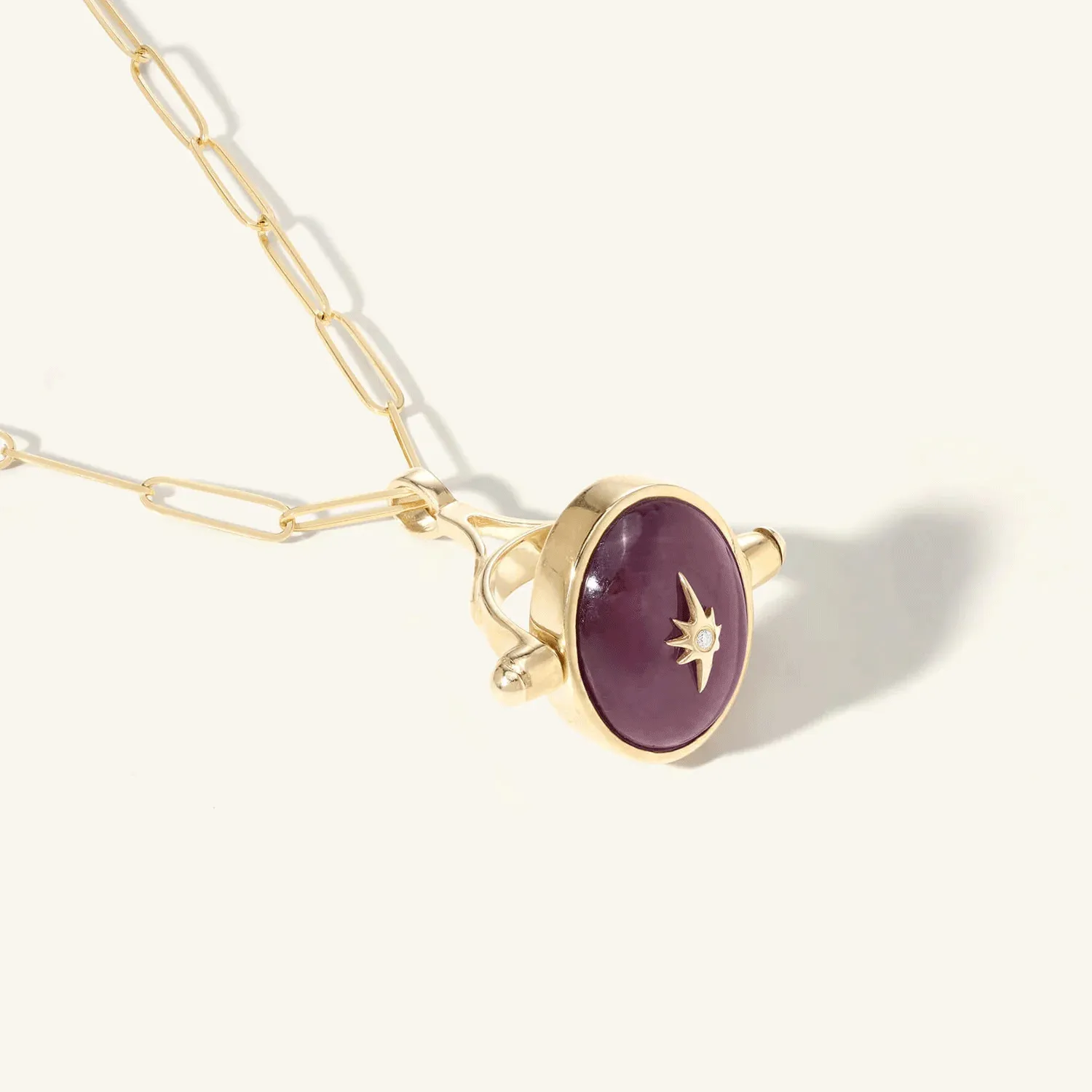 Oval Cabochon Ruby Spinning Pendant with Star Overlay