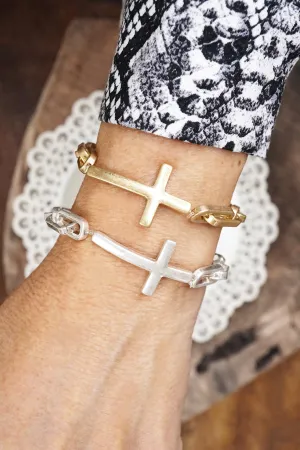 Sideways Cross bracelet worn gold silver tone stretch chain minimal style